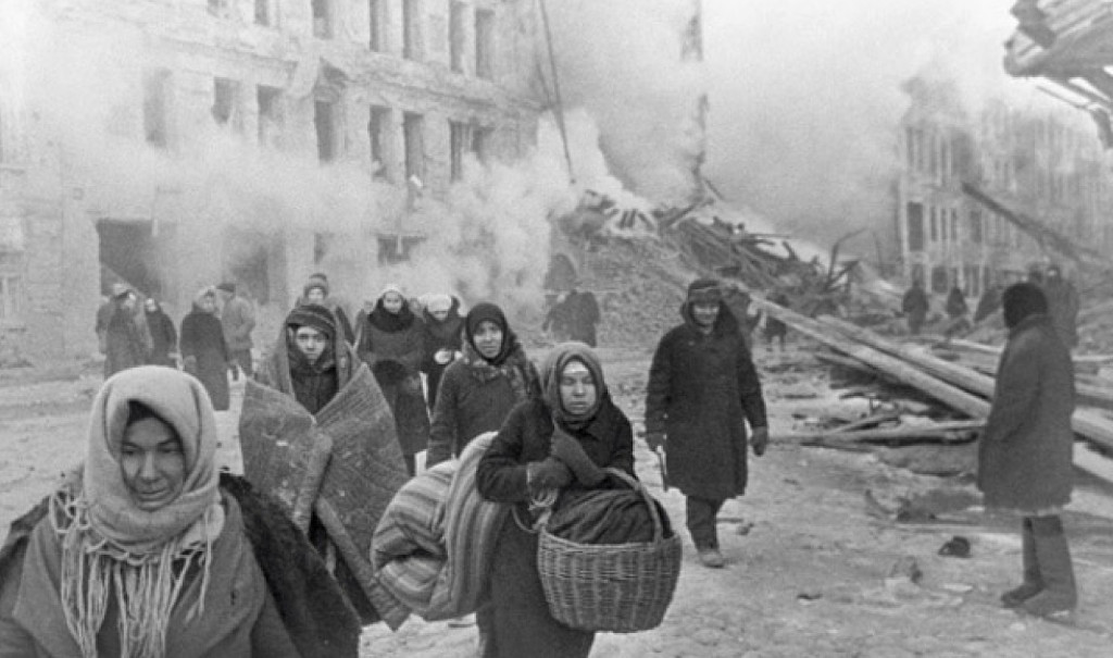 Civilians eacuating a burning building during the Siege of Leningrad