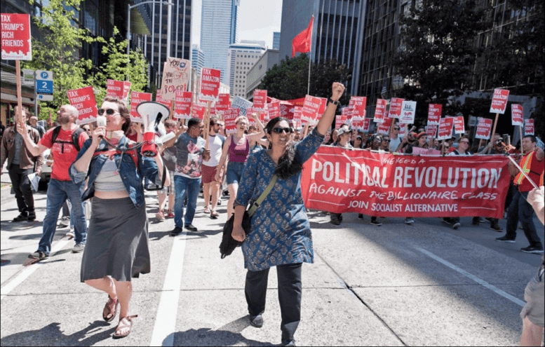 Socialist Alternative councilwoman Kshama Sawant leads a protest march in Seattle, WA