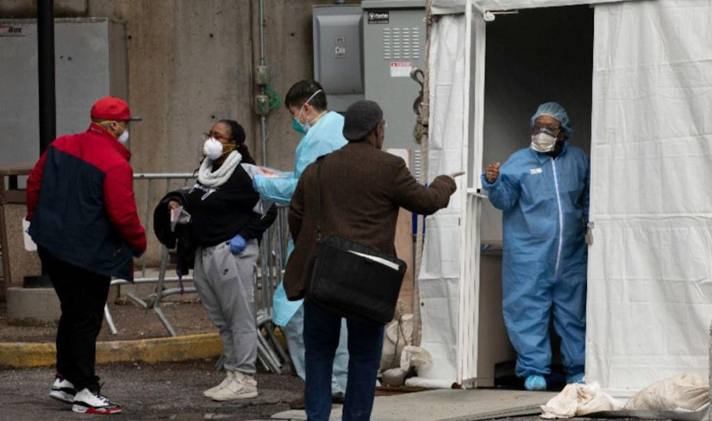 People in front of a hospital in New York City